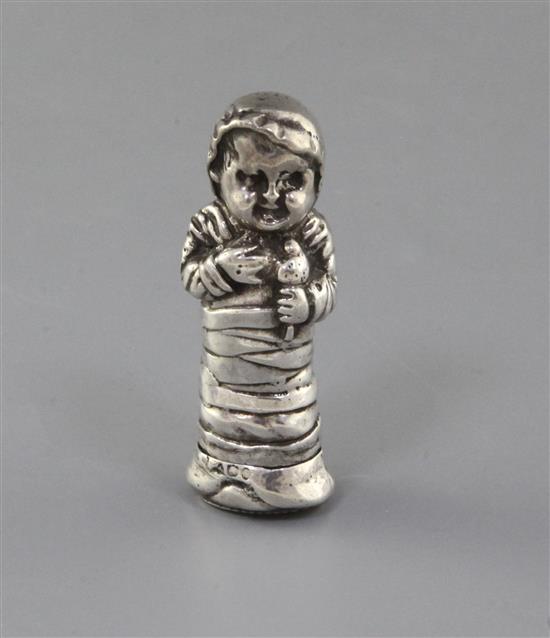 A late Victorian novelty silver vesta case modelled as a baby wrapped in swaddling clothes, Edwin Thompson Bryant, London, 1895,